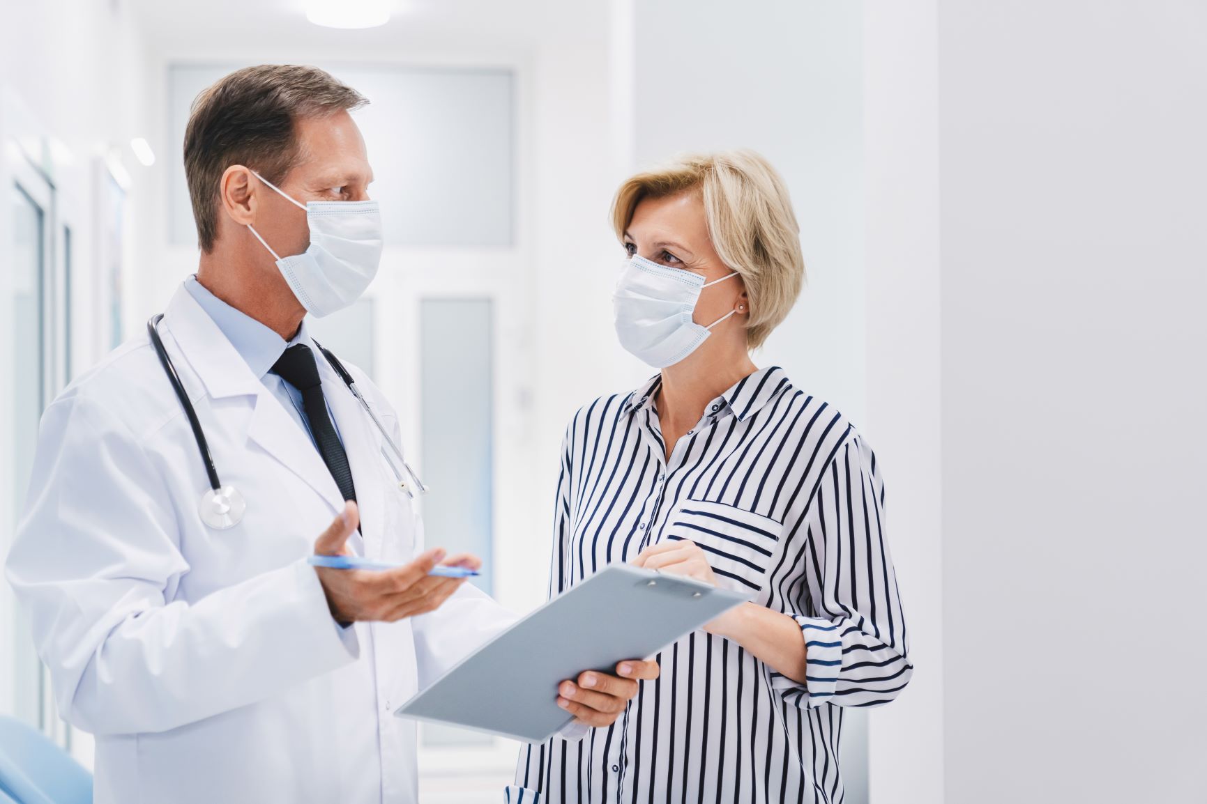 doctor speaking to patient