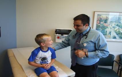 doctor with pediatric patient