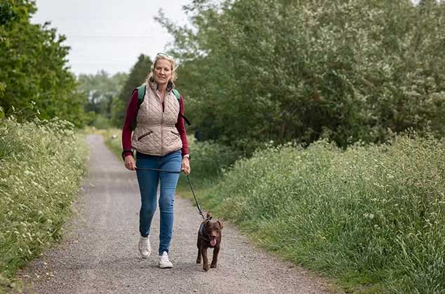 woman walking her dog
